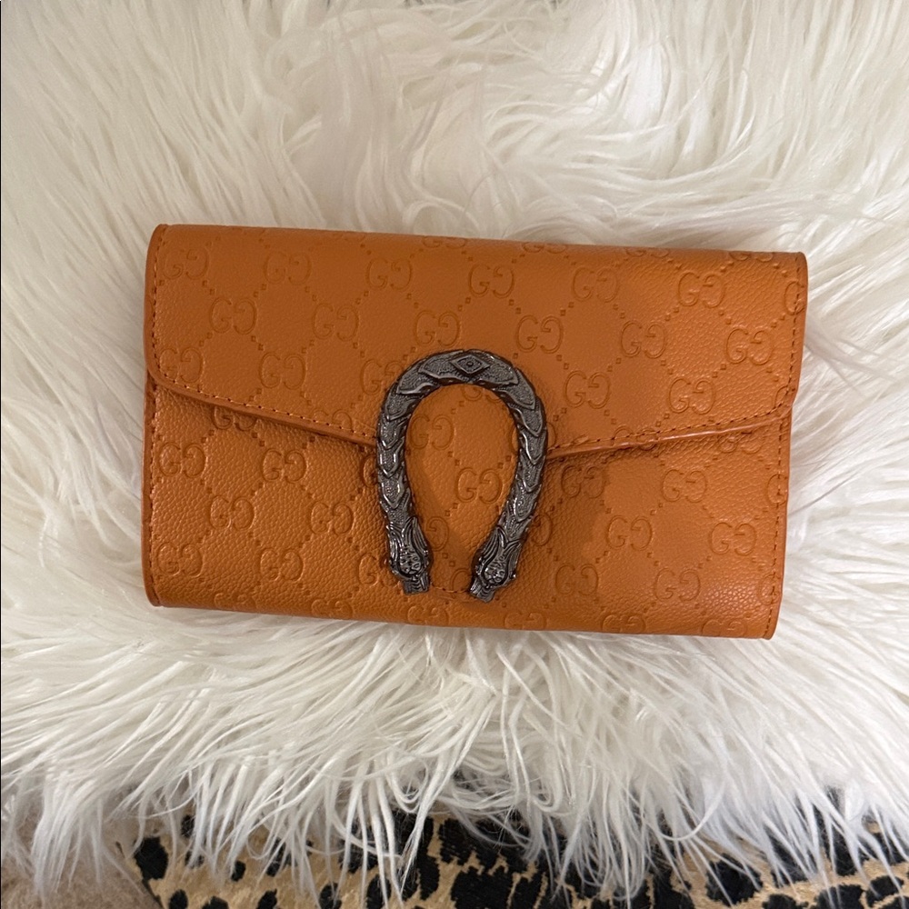 Tan Embossed Leather Clutch